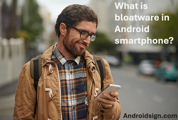 A man checking what is bloatware in Android smartphone?